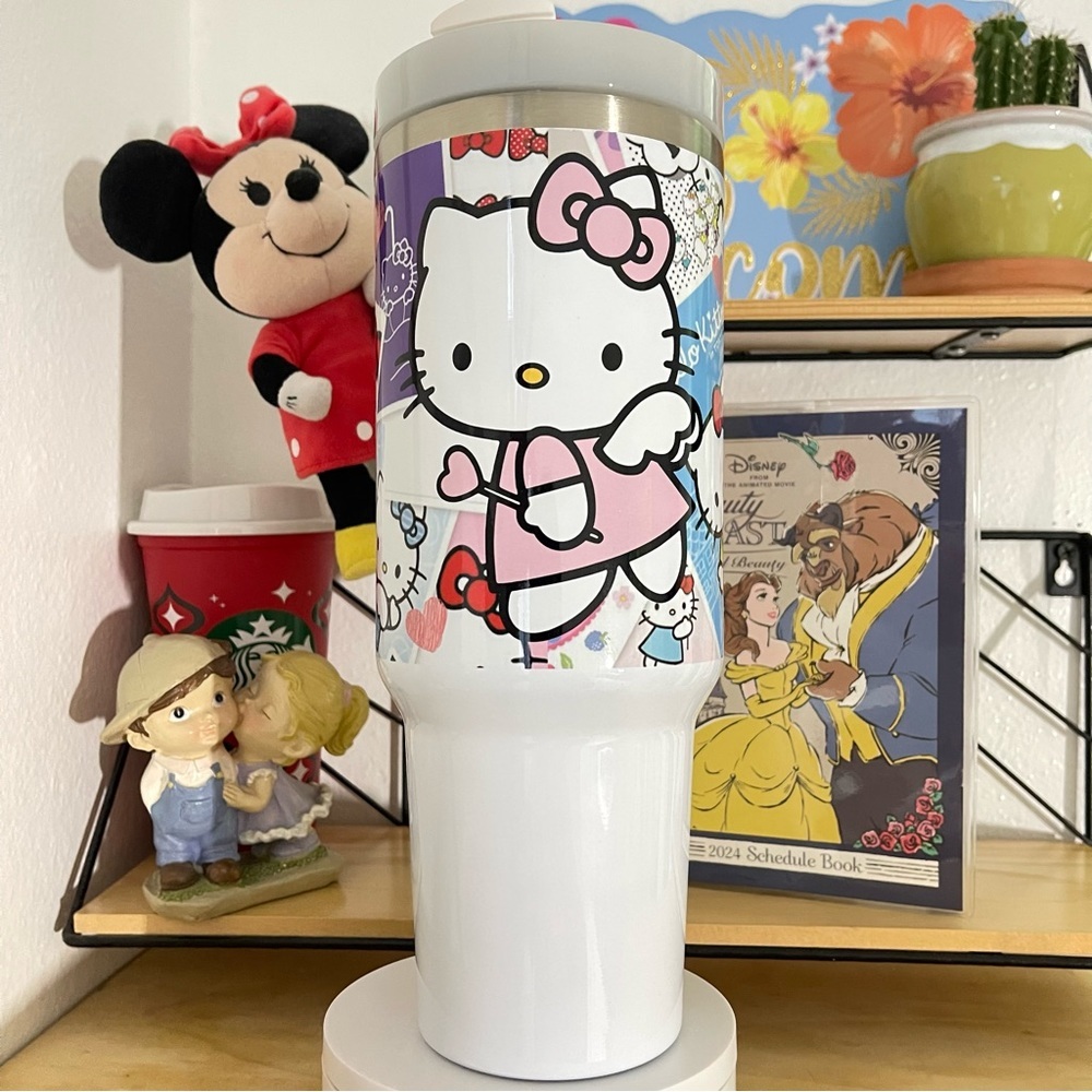 Sanrio Hello Kitty Tumbler 40 oz tumbler with hand carry handle. Brand New. 40